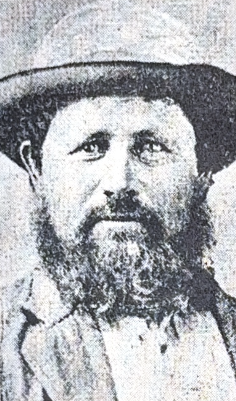 Portrait of bearded man with hat